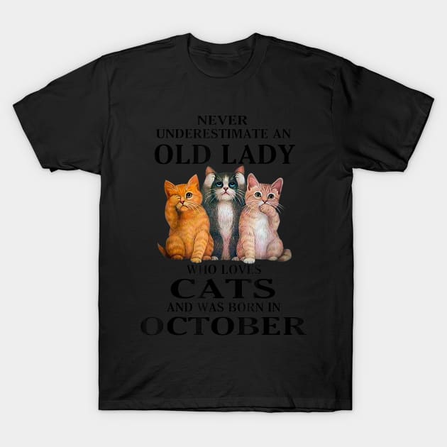 Never Underestimate An Old Lady Who Loves Cats And Was Born Us October T-Shirt by Levandotxi